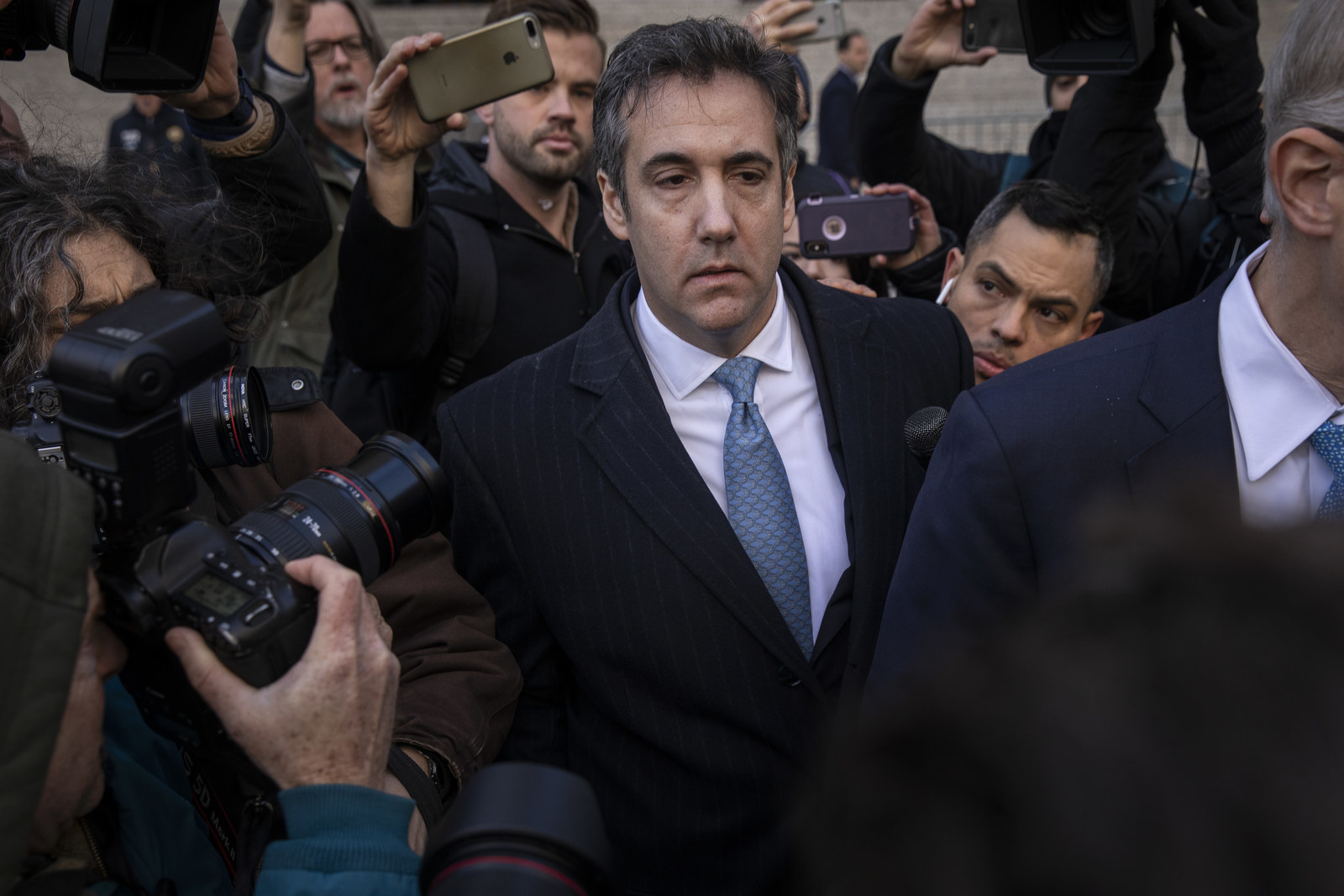 Michael Cohen, former personal attorney to President Donald Trump, exits federal court, on Nov. 29 in New York City.